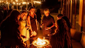 Guests at the fire pit - Boulder Ridge by Wedgewood Events
