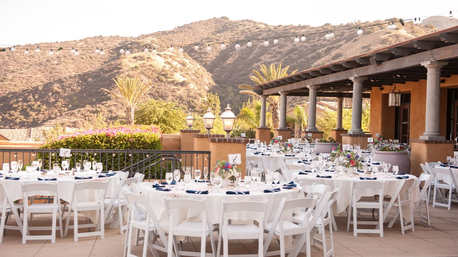 Outdoor reception with white and blue accents - The Retreat by Wedgewood Events