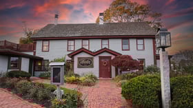 Charming exterior of the historic Barker House by Wedgewood Events