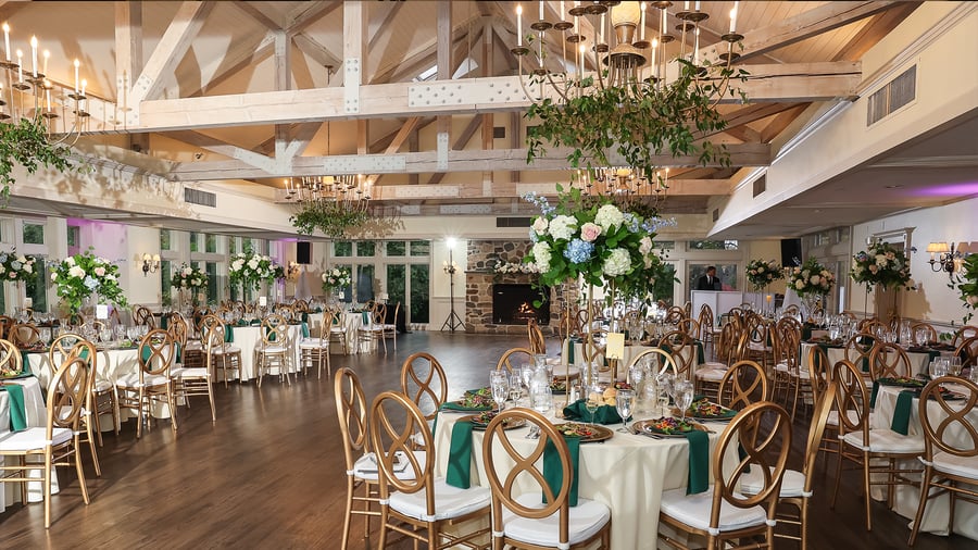 Elegant gold and white event setup at Barker House by Wedgewood Events