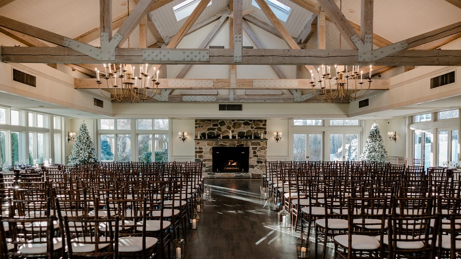 Indoor ceremony setup at Barker House by Wedgewood Events