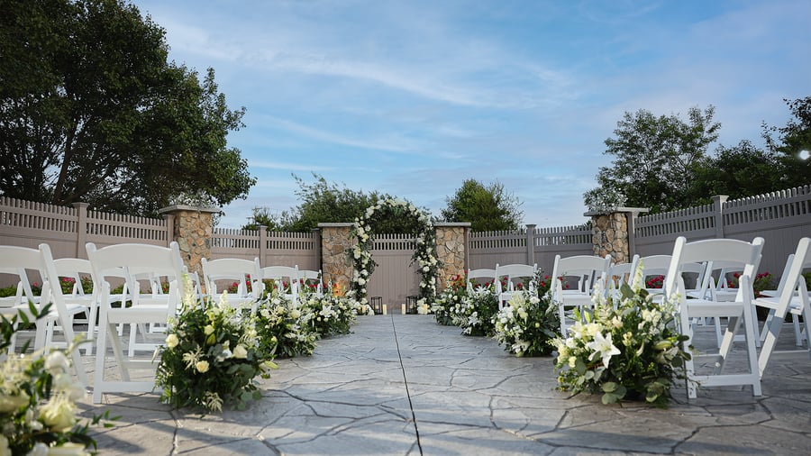 Outdoor garden with florals  at Barker House by Wedgewood Events
