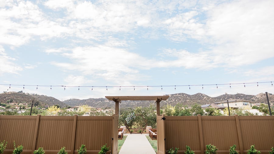 Outside of ceremony with hill views - Canopy Grove by Wedgewood Events