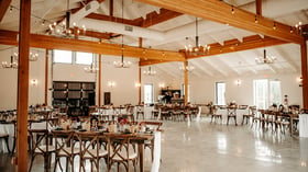 Social event with farm tables in grand hall - Canopy Grove by Wedgewood Events