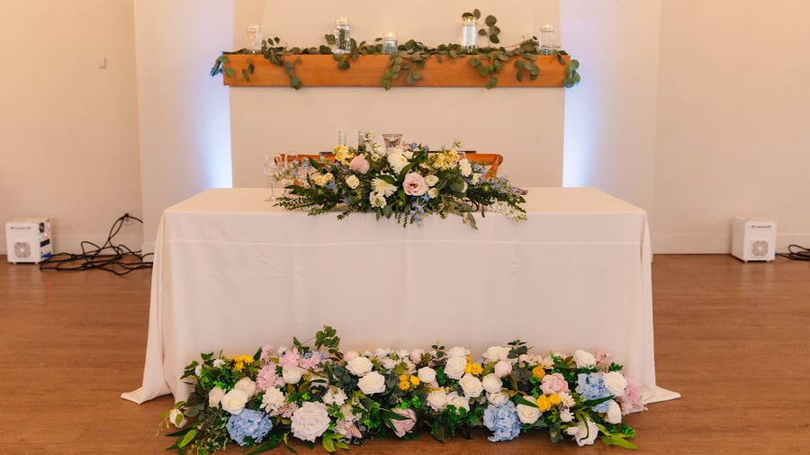 Fireplace with florals - Carmel Fields by Wedgewood Events