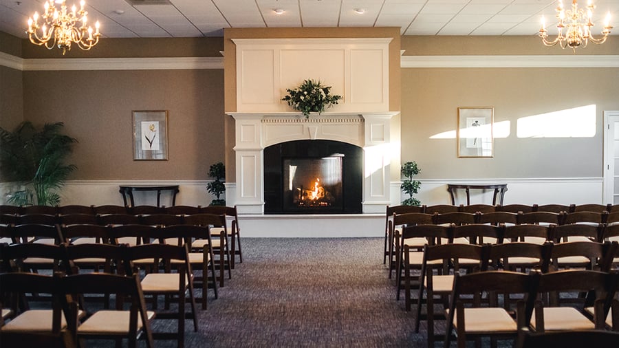 Indoor gathering area with fireplace - Groveland Fairways by Wedgewood Events