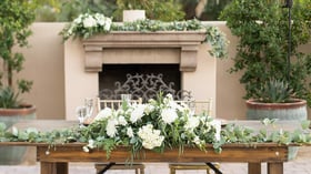 Table in front of fireplace - Secret Garden by Wedgewood Events