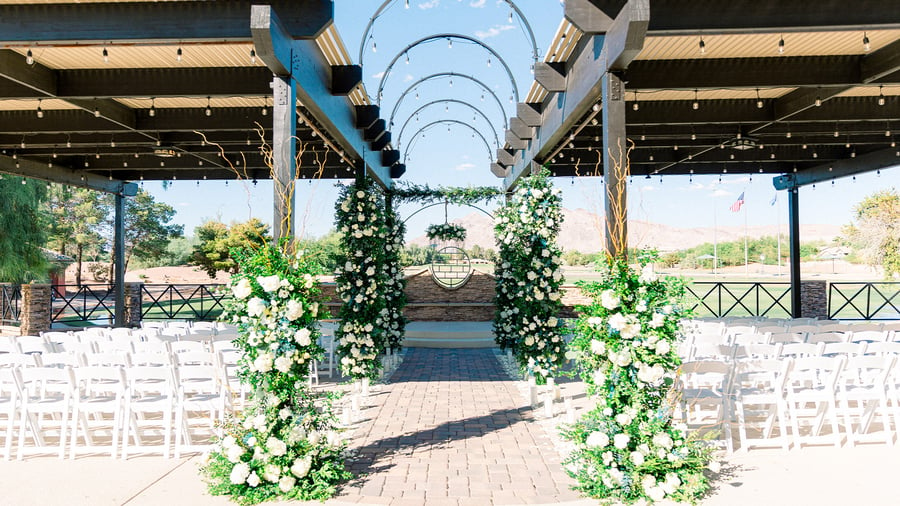 Patio ceremony with flowers - Stallion Mountain by Wedgewood Events