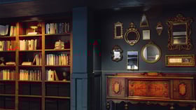 Bookshelves and decor in bar area - Sterling Hotel by Wedgewood Events
