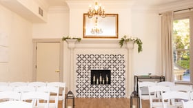Fireplace in indoor ceremony site - Sterling Hotel by Wedgewood Events
