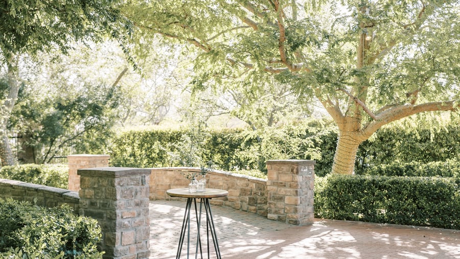 Cocktail table on stone bridge at Stonebridge Manor by Wedgewood Events