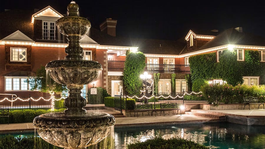 Exterior back of Stonebridge Manor by Wedgewood Events at night