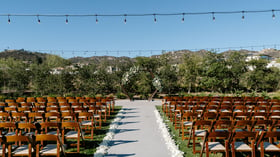 Outdoor ceremony with hexagon arch - Canopy Grove by Wedgewood Events